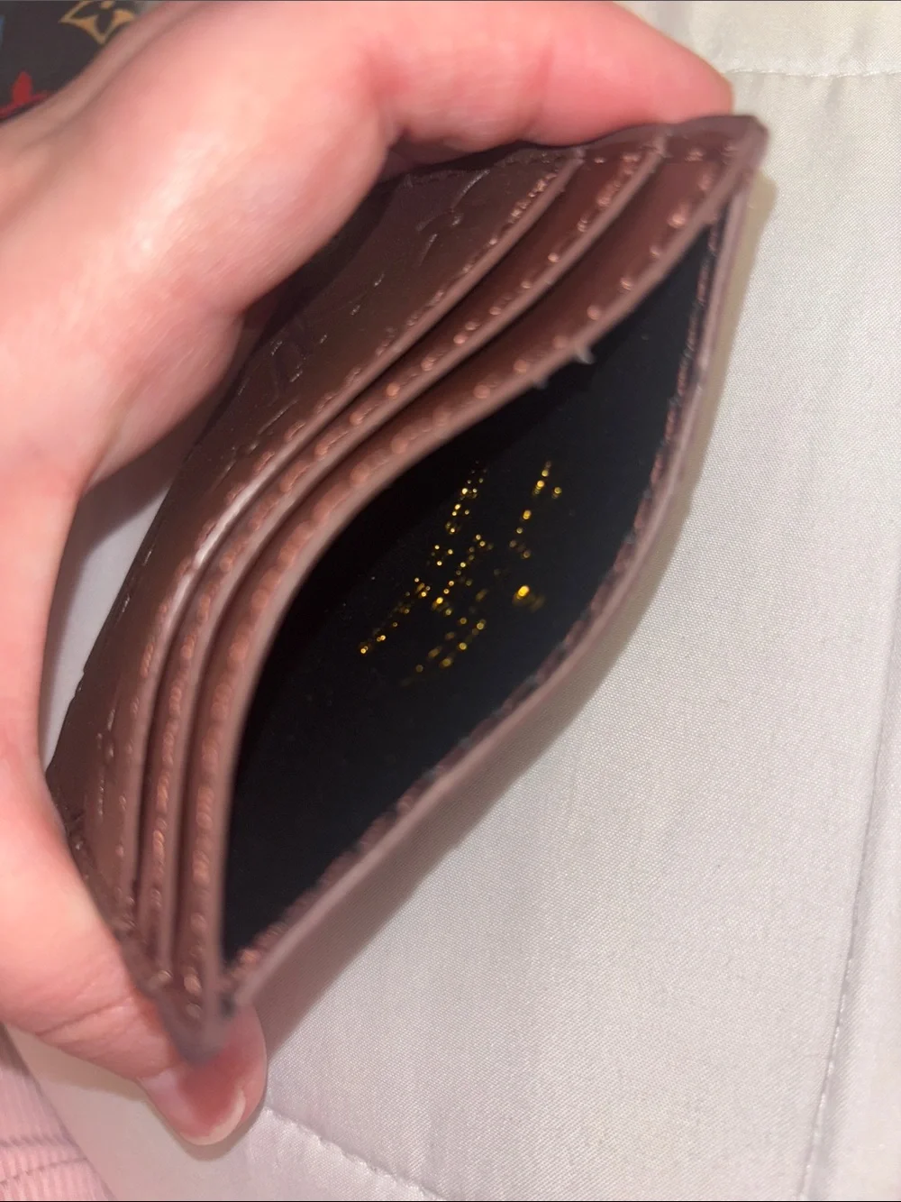 Brand New !! Brown Embossed Monogram Card Case